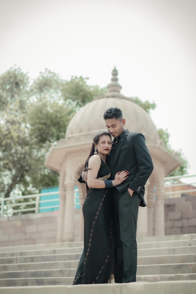 Faiz & Yasmin pre-wedding couple shoot in elegant black attire on sandstone temple stairs